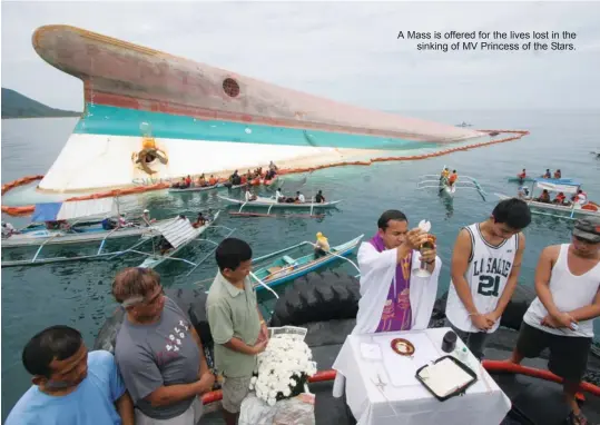  ??  ?? A Mass is offered for the lives lost in thesinking of MV Princess of the Stars.