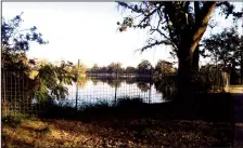  ?? SCOTT HOWELL/NEWS-SENTINEL ?? Fencing has been installed to protect against erosion on a stretch of river beyond the northwest side of Lodi Lake.