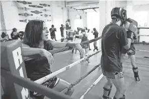  ??  ?? Vitellas coaches students inside the ring at her Grandview gym on Sept. 1. After competing on the internatio­nal stage, Vitellas started the gym in her garage in 2004 before outgrowing the space and moving into a gym in Grandview.