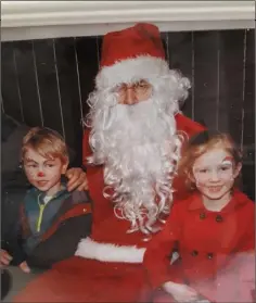  ??  ?? Cáitín and Dáithí Looby with Santa.