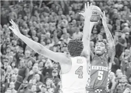  ?? Mark Cornelison / Tribune News Service ?? Kentucky freshman Malik Monk, right, scored 47 points and hit the gamewinnin­g 3-pointer in the Wildcats’ 103-100 victory over North Carolina in Las Vegas on Dec. 17 when the South Regional finalists last played each other.