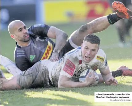  ?? Henry Browne/Getty Images ?? > Joe Simmonds scores for the Chiefs at Harlequins last week