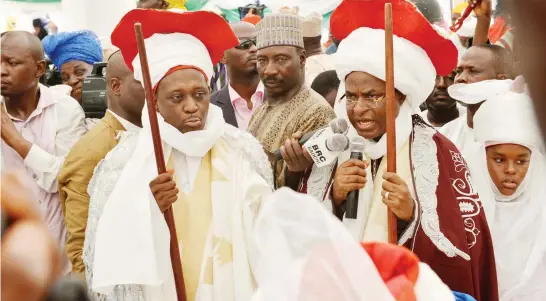  ??  ?? Governor Isa Yuguda of Bauchi (right) and former minister of State for Health, Dr Mohammed Ali Pate, during their turbanning as Dan’Isan Misau and Cigarin Misau respective­ly by the Emir of Misau, Alhaji Muhammad Manga, in Misau Bauchi State on Saturday.