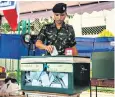  ??  ?? A Thai soldier votes in the first election since the country’s military seized power