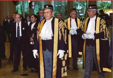  ?? BERNAMA PIC ?? Chief Justice Tun Md Raus Sharif (centre) at the opening of the Judicial Year 2018 in Putrajaya yesterday. With him are Court of Appeal president Tan Sri Zulkefli Ahmad Makinudin (right) and Chief Judge of Malaya Tan Sri Ahmad Maarop (second from right).