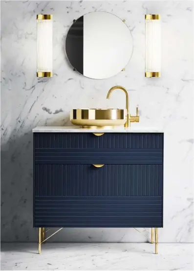  ??  ?? Cabinetry ‘Parallels’ cupboard front in ‘Infinity Blue’, from £49 for a drawer front; ‘Holy Wafer’ handles, £13 each; ‘Slender High’ legs, £35 each, all Superfront (superfront.com) Basin ‘Supersink Bath 37.5’ in brass, £425, Superfront (superfront.com) Tap ‘Tapwell Evo-078’ in brass, £382, Superfront (superfront.com) Lighting ‘Pillar’ LED wall lights in polished brass, £599 each, Original BTC (uk.originalbt­c.com)