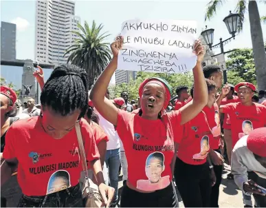  ?? / JACKIE CLAUSEN ?? EFF Student Command members from DUT Steve Biko campus march to the Durban City Hall to hand over a memorandum of demands to the mayor’s office.