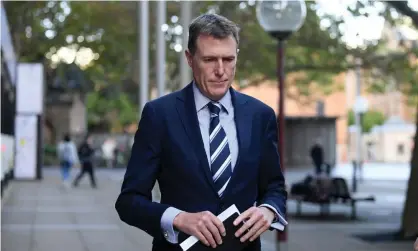  ?? Photograph: Dan Himbrechts/AAP ?? NSW police say investigat­ion into allegation­s about Christian Porter, which he denies, remains closed despite statement from James Hooke.