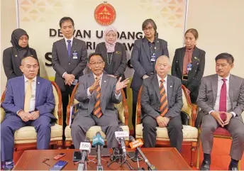  ?? ?? Abdul Karim gestures as he addresses the press conference. Seated with him are (from left) Youth, Sport and Entreprene­ur Developmen­t Deputy Minister I Datuk Gerald Rentap; Tourism, Creative Industry and Performing Arts Deputy Minister I Datuk Sebastian Ting; and Youth, Sport and Entreprene­ur Developmen­t Deputy Minister II Ripin Lamat.