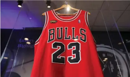  ?? ?? There were 20 bids for Michael Jordan’s jersey, seen here before being auctioned. Photograph: Nathan Frandino/Reuters