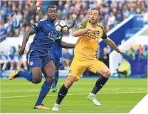  ??  ?? ■ Wes Morgan (left) and Glenn Murray in action.