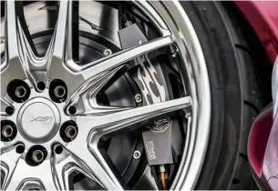  ??  ?? A serious braking package sits behind the 19s in the form of project U monoblock six- and four-pot calipers, and two-piece 380mm and
355mm rotors which have Weld’s signature tribal design CNC cut for vents. Crazy, yes, but a very subtle personal touch