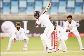  ??  ?? Sri Lanka’s Sadeera Samarawick­rama plays a shot during the third day of the second Test cricket match against
Pakistan in Dubai, United Arab Emirates on Oct 8. (AP)