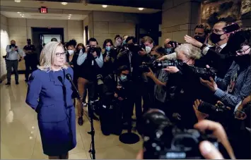  ?? Stefani Reynolds / New York Times ?? Rep. Liz Cheney, R-wyo., speaks to reporters at the Capitol in Washington on Wednesday following a Republican vote to remove her from her leadership position.