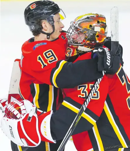  ?? AL CHAREST ?? Matthew Tkachuk has a big hug for goaltender David Rittich following their 5-3 win over Colorado Wednesday at the Saddledome. Post-game hugs for Rittich from the young winger have become a tradition. “I have no clue when it started,” Rittich said.