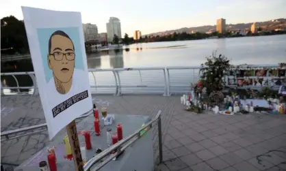  ??  ?? A memorial to Sean Monterrosa, George Floyd and other victims of police violence is seen at Lake Merritt in Oakland, California, on 8 June. Photograph: MediaNews Group/East Bay Times/Getty Images