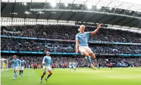  ?? McNulty/Manchester City/Manchester City FC/Getty Images ?? Erling Haaland celebrates after scoring in the Manchester derby. Photograph: Matt