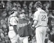  ?? Wally Skalij Los Angeles Times ?? DAVE ROBERTS pulls Clayton Kershaw from Game 1, which was not his most controvers­ial decision.