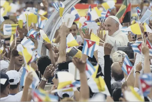  ??  ?? Pope Francis greeted by worshipper­s as he arrives at Revolution Plaza in Havana during his first visit to Cuba yesterday Picture: Afp/getty Images