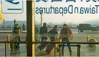  ?? — AFP ?? Tourists at Beijing Internatio­nal Airport. Ctrip handled almost 70 per cent of Chinese online travel transactio­ns.