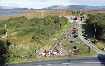  ??  ?? Above: A drone shot shows the standard and narrow gauge lines together at Maam Cross station’s superb scenic setting.
Photo: Connemara Railway