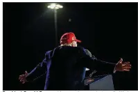  ?? (The New York Times/Doug Mills) ?? President Donald Trump addresses the crowd at a rally Wednesday evening at the airport in Des Moines, Iowa.