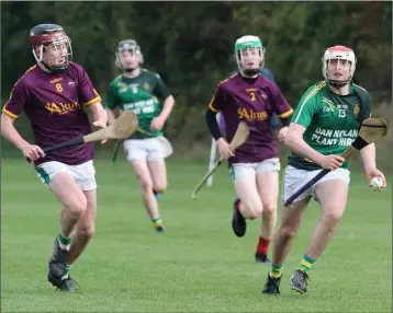  ??  ?? Darragh Furlong of Enniscorth­y C.B.S. considers his options as Jack Higgins (Gorey C.S.) moves in.