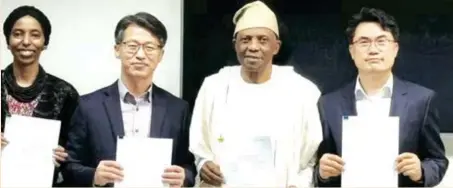  ?? ?? L-R: Amy Jadesimi, managing director, LADOL; Jejin Jeon, outgoing managing director, Samsung Heavy Industries Nigeria Limited (SHIN); Ladi Jadesimi, chairman, LADOL; and Jongseok Kim, new managing director, SHIN, during the signing of the final settlement of the dispute between the companies in Lagos, recently