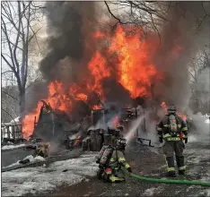  ?? SUBMITTED PHOTO — BOYERTOWN FIRE & RESCUE ?? Firefighte­rs battle a blaze engulfing a garage in Douglass (Berks) Township Feb. 11. The structure was a total loss.