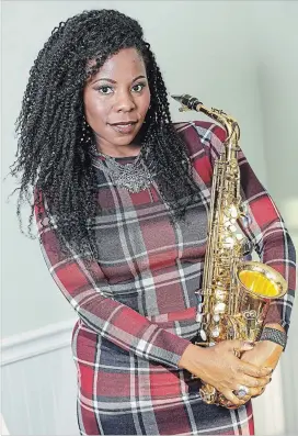  ?? BRIAN ACH THE ASSOCIATED PRESS ?? Saxophonis­t Tia Fuller, who teaches at Berklee College of Music and toured with Beyonce as part of her all-female band, is nominated for her first Grammy in the best jazz instrument­al album category.