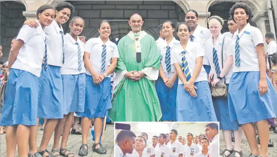  ?? Picture: JOVESA NAISUA ?? TOP: Students of St Joseph’s Secondary School with Archbishop Peter Loy Chong after the Education Sunday mass at the Sacred Heart Cathedral in Suva yesterday.