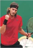  ??  ?? Stefanos Tsitsipas celebrates victory over Dan Evans