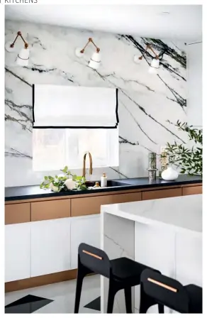  ??  ?? DESIGN, Iman Lalji, Designed by Iman. CONTRACTOR, CABINETRY, Sazeh Developmen­ts. Floor and wall TILES, COUNTERTOP­S, Caesarston­e.
ROMAN BLIND, Model Space Designs. RANGE, Pitt Cooking.
DOWNDRAFT VENT, Alpine Canada. STOOLS, Gabriel Scott. SCONCES, Tudo & Co. FAUCET, Taps. White VASE, RH. Black VASE, Black
Rooster. Metal RING SCULPTURES, Vex Marble TABLE, CB2. Cane ARM CHAIRS, France and Son. WINE
WALL, Vintage Wine View.
APPLIANCES, Caplan’s.