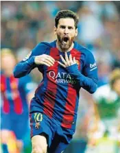  ?? OSCAR DEL POZO/AFP/GETTY IMAGES ?? Barcelona’s Argentinia­n forward Lionel Messi celebrates after scoring during the Spanish league Clasico match against Real Madrid.