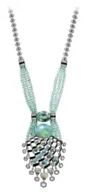  ??  ?? Matsuri necklace in platinum with a 14.82-carat opal, a 7.25-carat tourmaline, tourmaline beads, onyx and diamonds