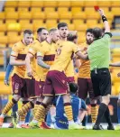  ??  ?? Fury Liam Donnelly is shown a red card late in the game