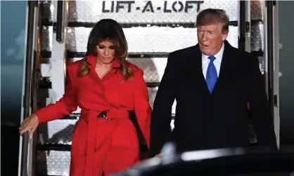  ?? Photograph: Andy Rain/EPA ?? Melania and Donald Trump arrive at Stansted on Monday night.