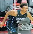  ?? RINGO H.W. CHIU/AP ?? Wendell Carter Jr. was part of Orlando’s closing rotation during Tuesday’s 103-97 win over Nicolas Batum and the Los Angeles Clippers.