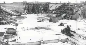  ?? FILES ?? Work on the building that was to become the Stampede Corral, replacing the Victoria Arena, is carried out in the winter of 1950. This view of the constructi­on, looking west, shows the forms for some of the seats and the entrances.