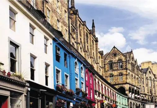  ??  ?? Colourful buildings in Victoria Street, in Edinburgh’s Old Town