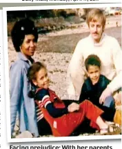  ??  ?? Facing prejudice: With her parents and brother Jamie in Cornwall