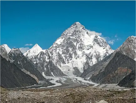  ??  ?? Pakistan’s K2 mountain peak, second highest mountain in the world, seen here in its summer coating of snow, has never been climbed in winter.