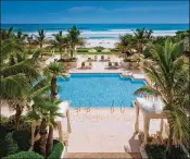  ?? CONTRIBUTE­D ?? Four Seasons Resort Palm Beach was named a five-star hotel by Forbes Travel Guide for the 20th consecutiv­e year. Its spa also was awarded five stars.