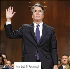  ?? WIN MCNAMEE / GETTY IMAGES ?? JUDGE BRETT KAVANAUGH is sworn in before testifying Thursday before the Senate Judiciary Committee on Capitol Hill.