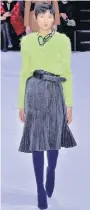  ?? GETTY ?? Balenciaga’s shaggy, neongreen top and pleated skirt.