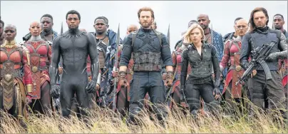  ?? AP PHOTO ?? This image released by Marvel Studios shows, front row from left, Danai Gurira, Chadwick Boseman, Chris Evans, Scarlet Johansson and Sebastian Stan in a scene from “Avengers: Infinity War,” premiering on April 27.