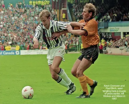  ?? ?? Kevin Donovan and Paul Birch, seen tangling here a couple of years earlier, left Wolves and Albion in 1997