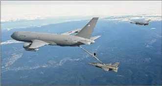  ?? CONTRIBUTE­D BY BOEING ?? A KC-46 Pegasus tanker refuels an F-16 Fighting Falcon in flight tests during the summer. WrightPatt­erson Air Force base houses the KC-46 Pegasus aerial refueling tanker program.