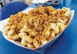  ?? Chuck Blount / Staff ?? The superlativ­e Crack & Cheese is a four-cheese blend topped with panko breadcrumb­s.