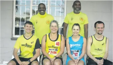  ?? ?? Lowvelders running the 2022 Comrades. Back: Ellon Maluleke (Bush Marathon Club), Given Mabunda (Bush), (front) William Brown (Run/Walk for Life (RWFL)), Shelley Parnell (RWFL), Anelise Naudé (Onderberg Marathon Club) and Steven Collins (RWFL).